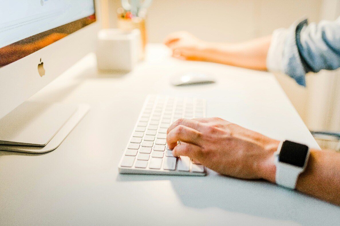 Man with Keyboard and Screen